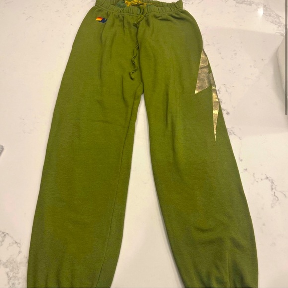 AVIATOR NATION ARMY GREEN SWEATPANTS WITH GOLD LIGHTNING BOLT - Picture 1 of 3
